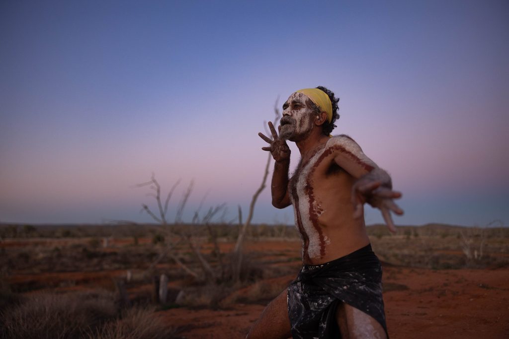 Portrait of a performer outdoors at dusk